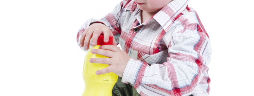 child touching dangerous item with lead in it